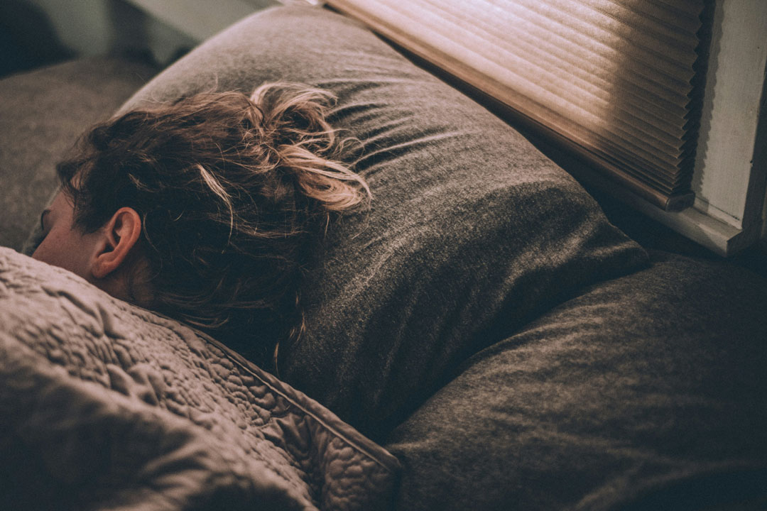 woman-sleeping-well-on-the-bed-by-greg-pappas-at-unsplash