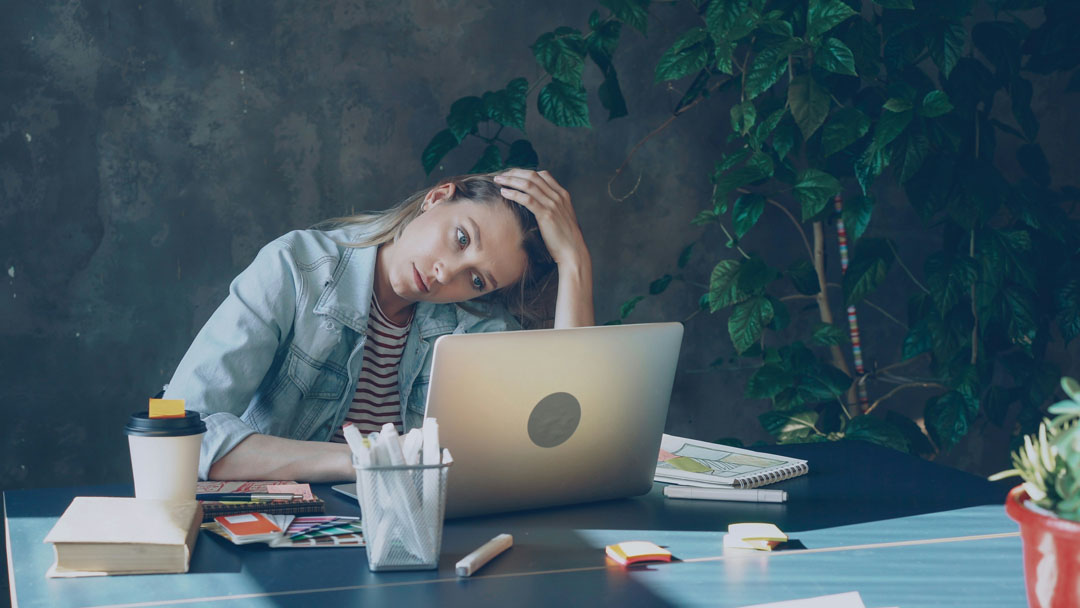 stressed-woman-at-work-by-vitaly-gariev-at-unsplash