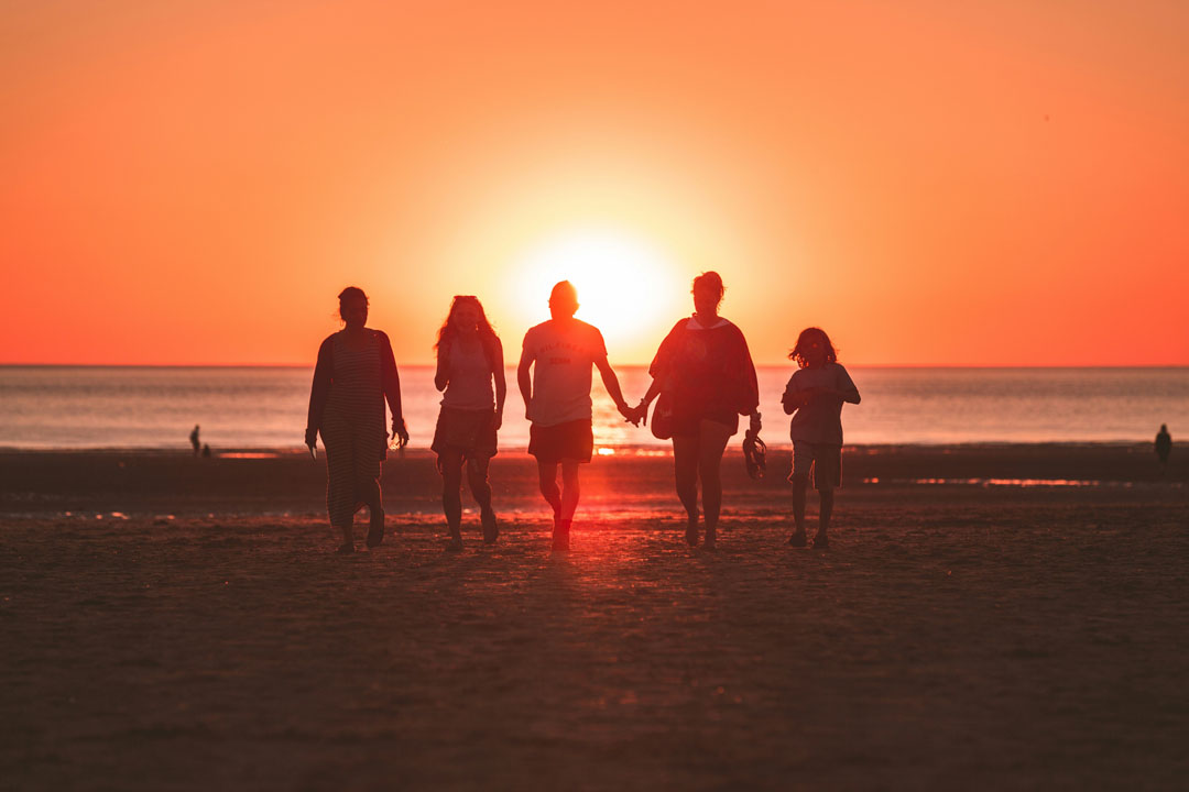 family-at-the-beach-sunset-by-kevin-delvecchio-unsplash