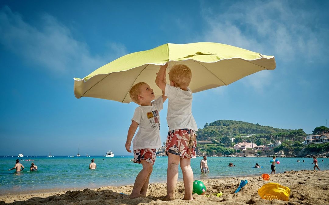 kids-summer-umbrella-vidar-nordli-mathisen-unsplash