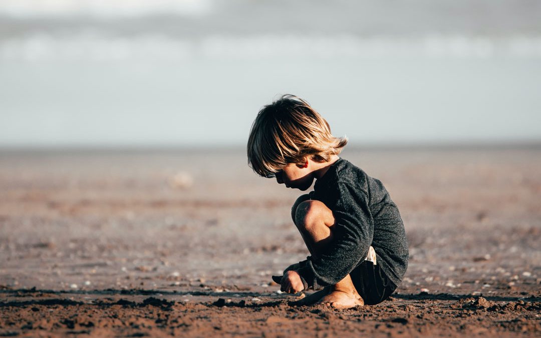 little-child-playing-on-the-sand-during-daytime-by-fermin-rodriguez-penelas-at-unsplash