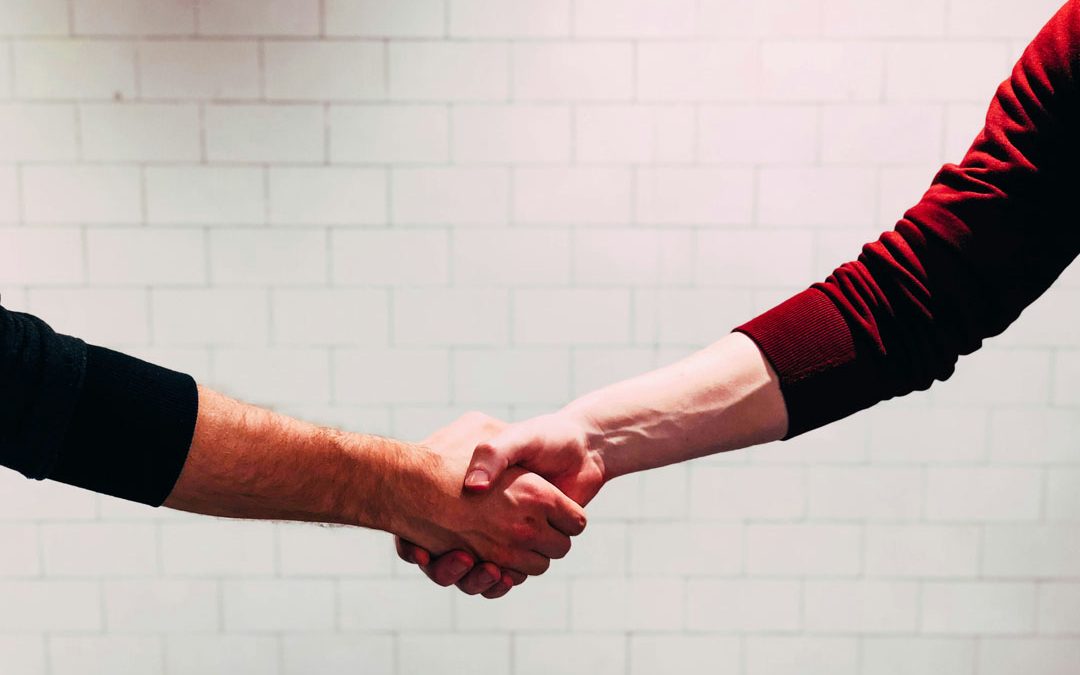 shaking-hands-chris-liverani-unsplash