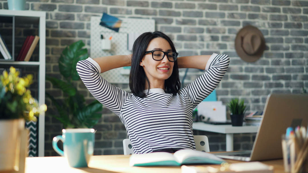 fulfilled-woman-in-her-office-vitaly-gariev-unsplash