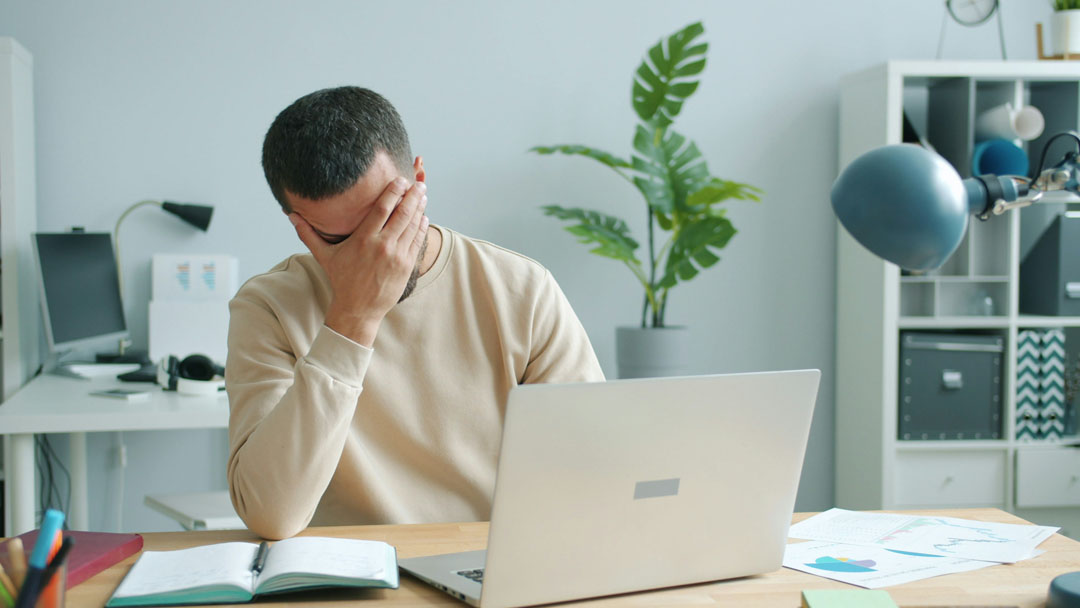 man-stressed-at-work-vitaly-gariev-unsplash